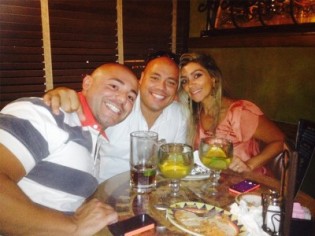 Erik (center) with his brother and sister